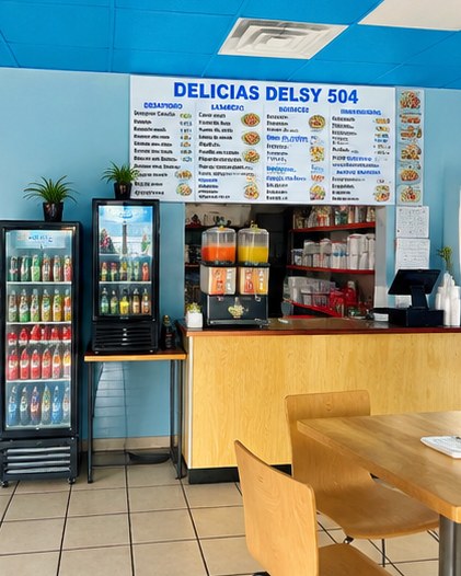 Our bright blue dining room and menu board